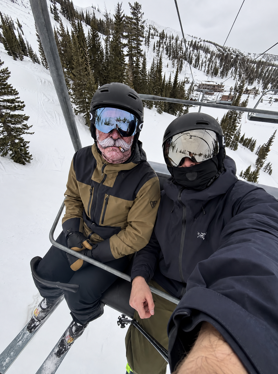 Happy skier or snowboarder